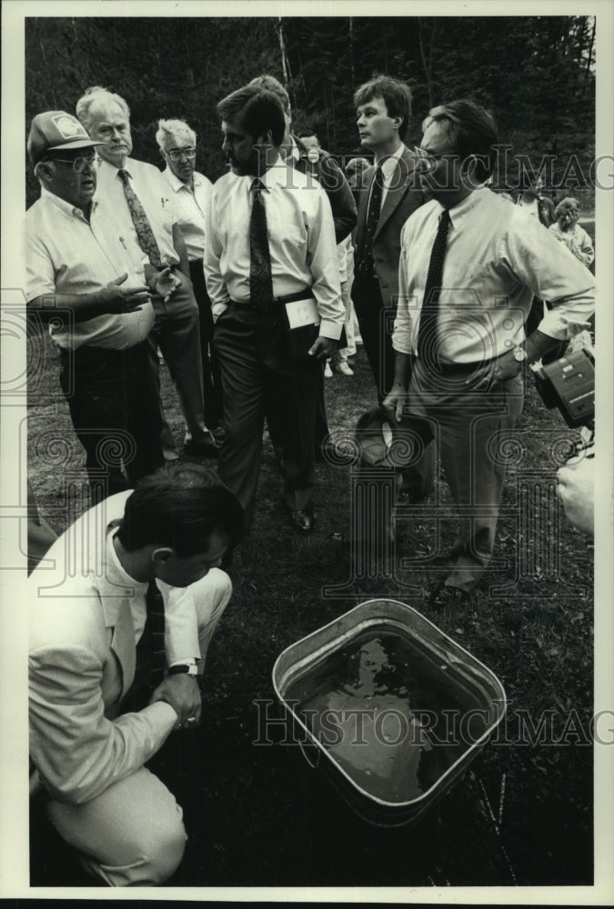 1990 Governor Tommy Thompson &amp; company at Woodruff Fish Hatchery - Historic Images