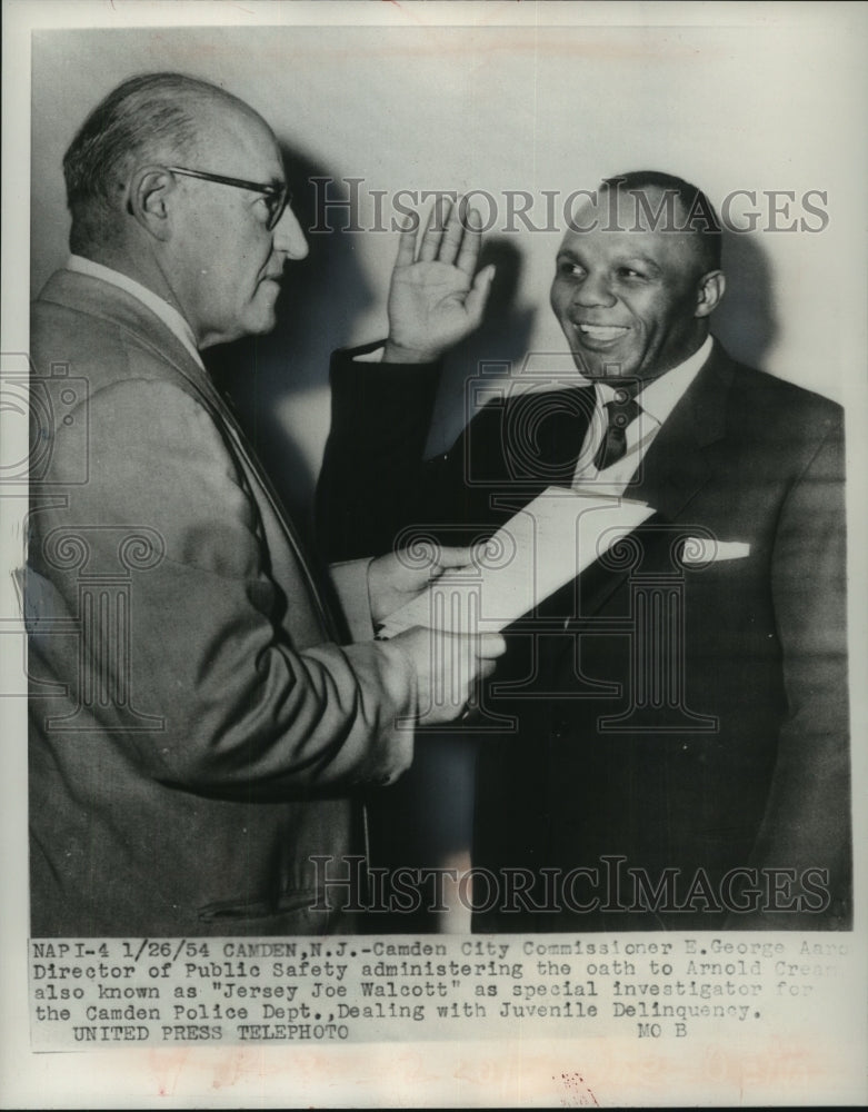 1954 Press Photo Jersey Joe Walcott, boxer, taking oath of office in Camden, NJ - Historic Images
