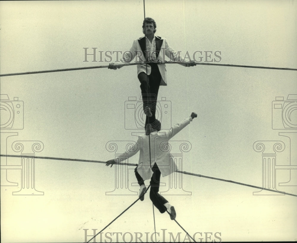 1983, Tightrope walkers Mike &amp; John Winn perform at Summerfest - Historic Images