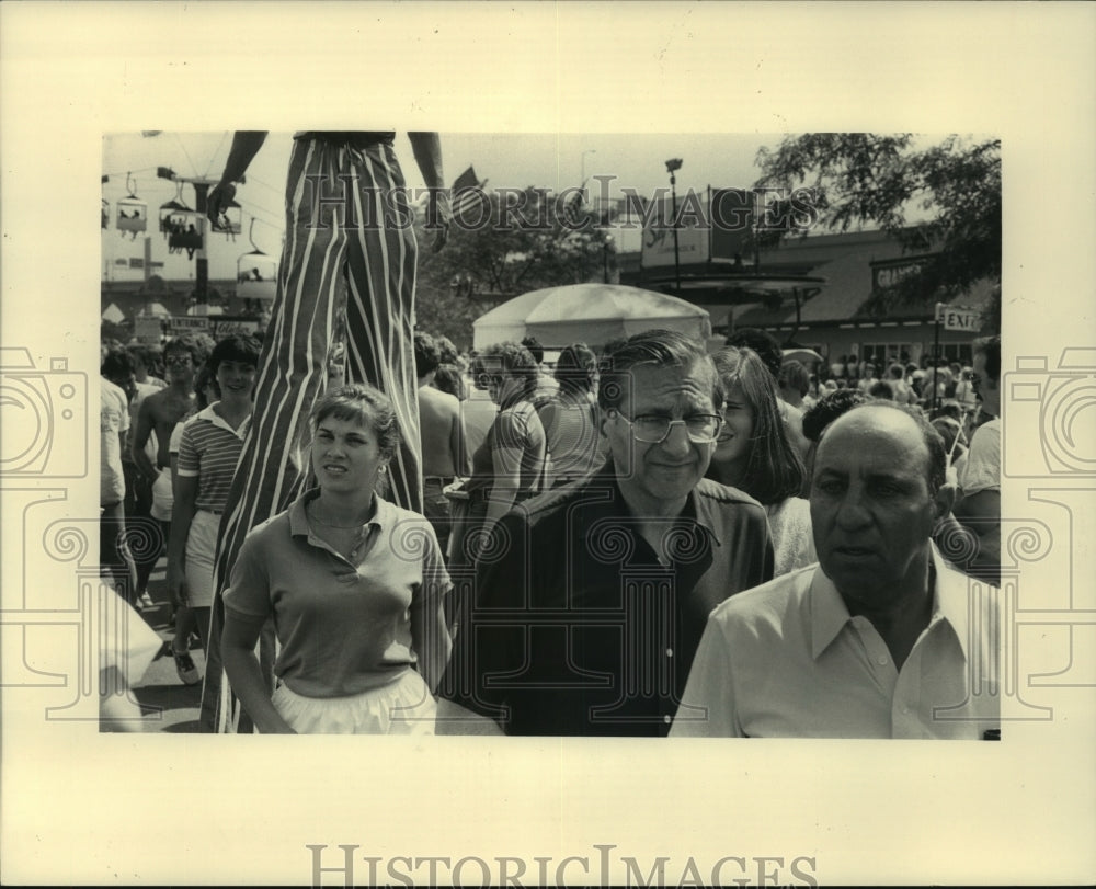 1983, A man on stilts joined the throng walking Summerfest grounds - Historic Images