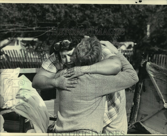 1985 Kathy Dawson amidst the rubble of her trailer in Wisconsin - Historic Images