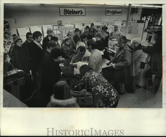 1976, Residents of West Bend, Wisconsin wait for dry ice after storms - Historic Images