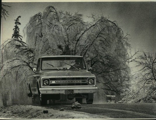 1976, Truck driving on icy road in Germantown, Wisconsin - mjc23031 - Historic Images