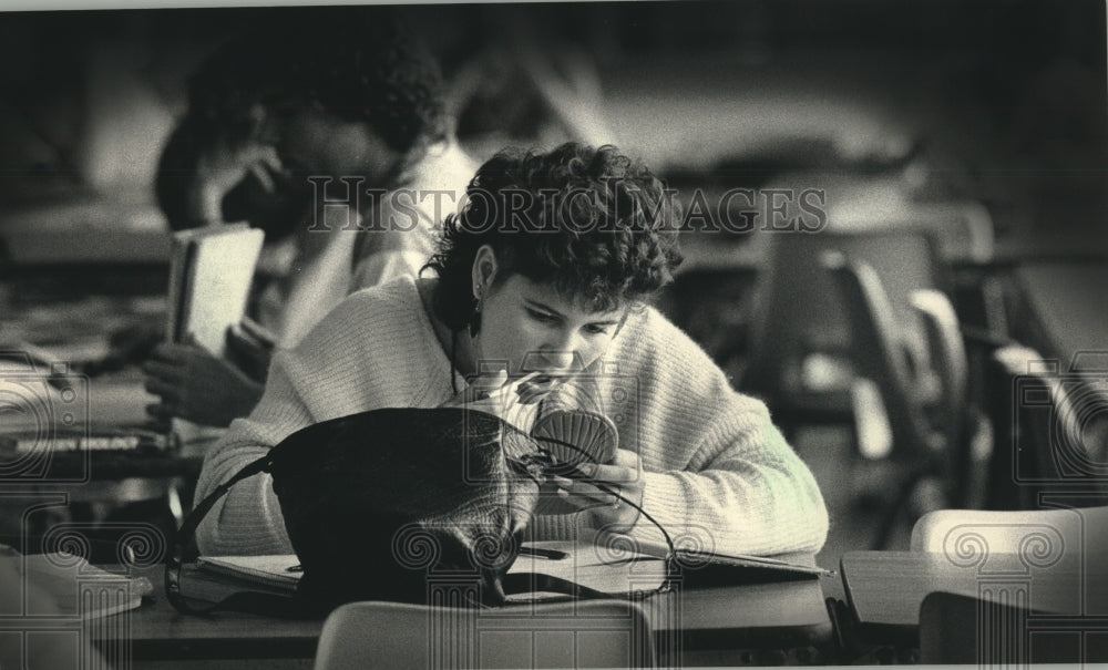 1986, St. Francis High School&#39;s Denise Doberstein during study hall - Historic Images