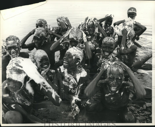 1962, Boys bathing in a lake at Kumi Leprosy Center, Uganda, Africa - Historic Images