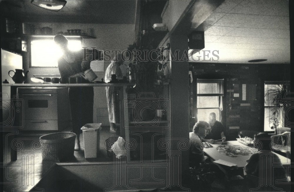 1993, tea is prepared in the Buddha center's kitchen - mjc23945 - Historic Images