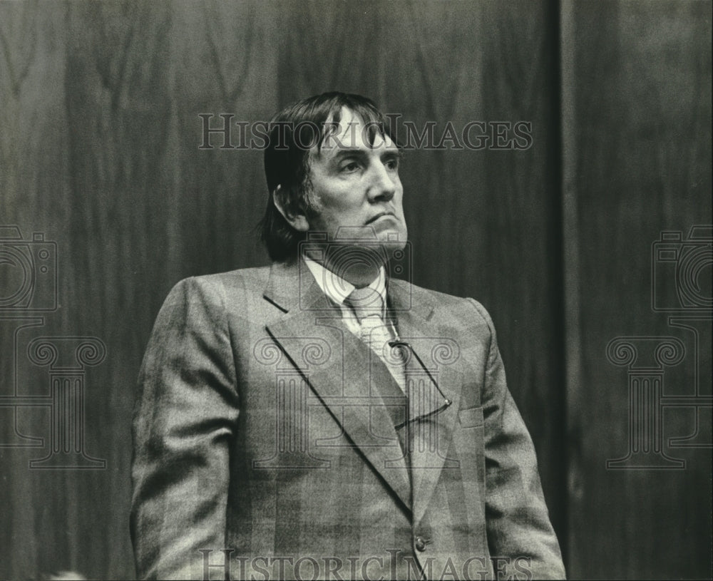 1980, Phil Komarek in the Christ Seraphim hearing. - mjc23955 - Historic Images