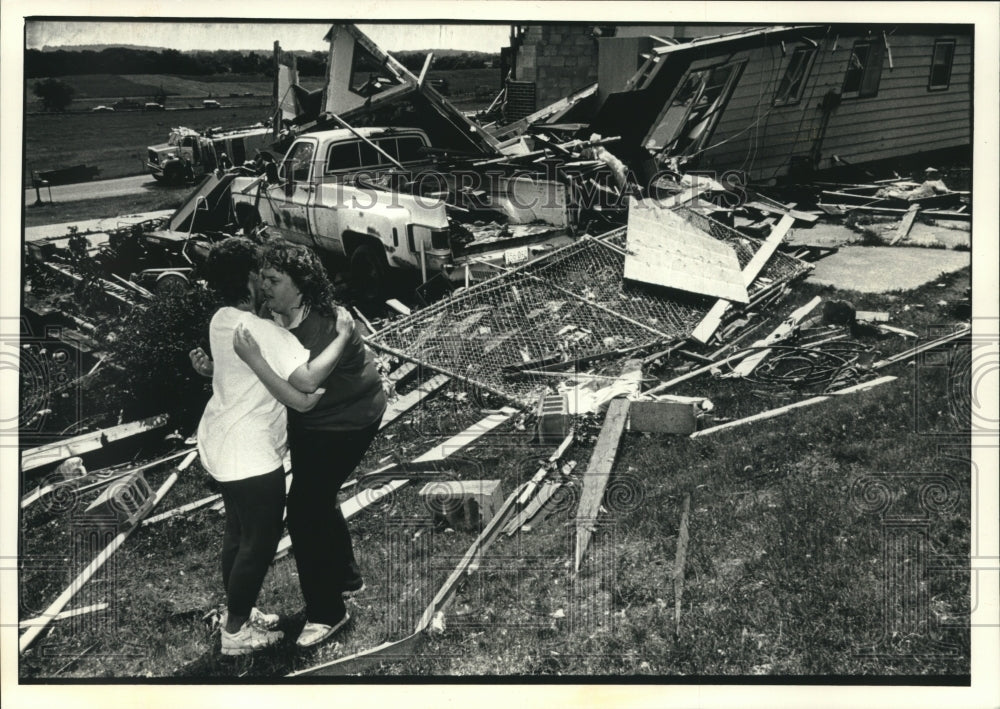 1992, Bette Steindorf with Trina Kluever After Storm Damaged Her Home - Historic Images