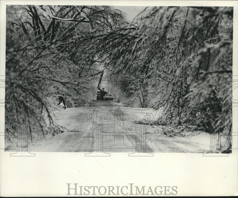 1976, Car moves past electric truck ice sleet covered road, Wisconsin - Historic Images