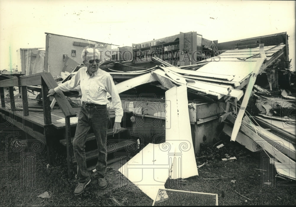 1986, Arthur Houghton outside his home after tornado, Cold Spring, WI - Historic Images