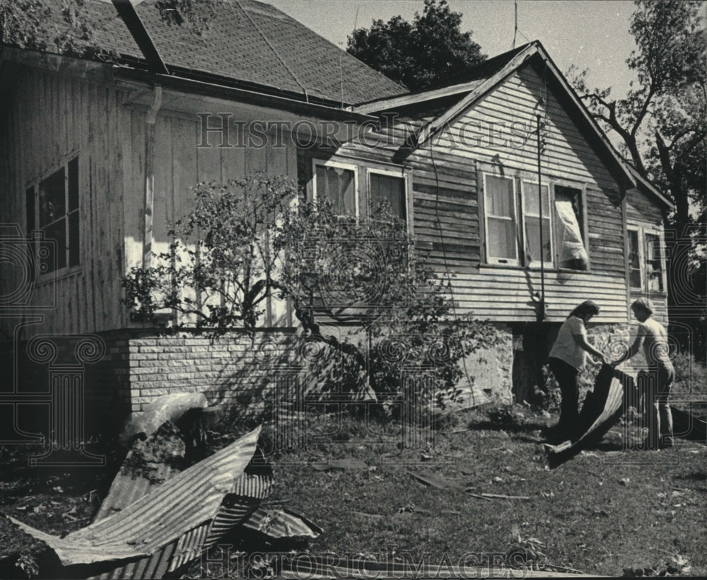 1985 Pamela and David Erickson Clear Debris from Home After Tornado - Historic Images