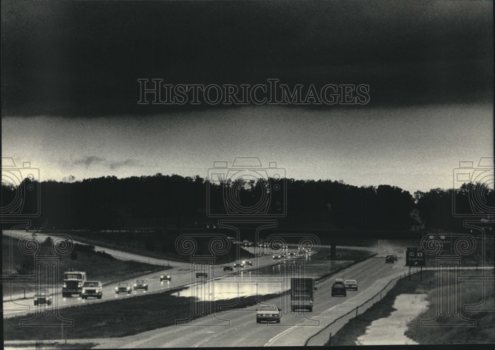 1986 Storm Clouds Over Interstate 43 in Ozaukee County, Wisconsin - Historic Images