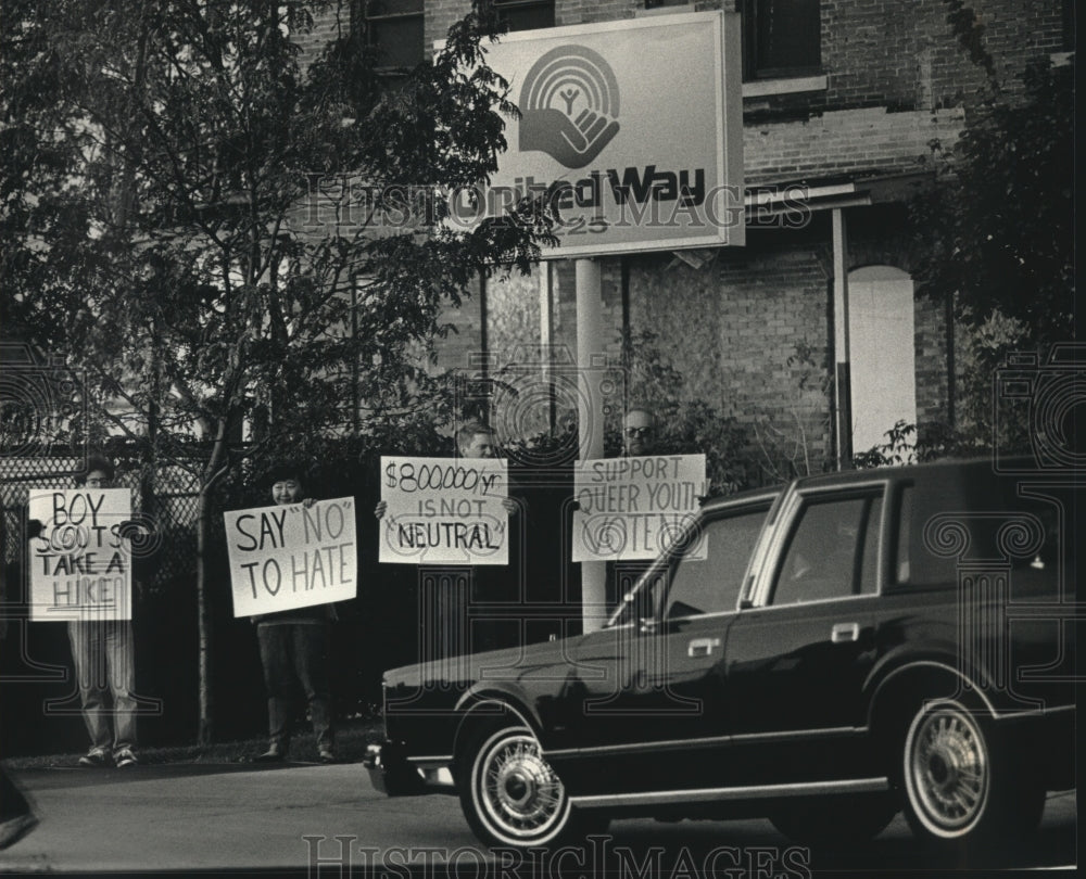1992, People at United Way Protesting Large Donation to Boy Scouts - Historic Images