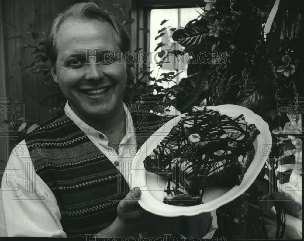 1994 Renaissance Baker Joel Sitka Shows Off His Espresso Brownies - Historic Images