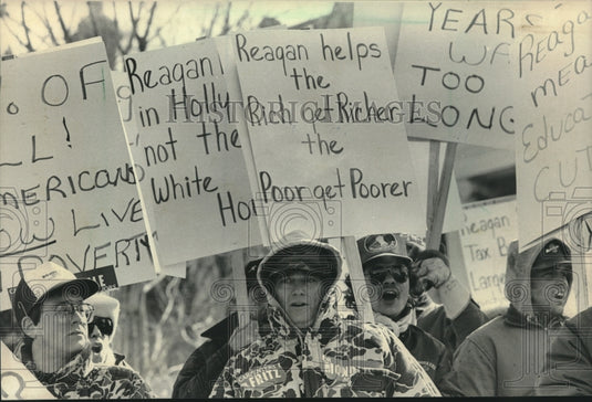 1984, Reagan protesters, with signs, parade route Dixon Illinois - Historic Images