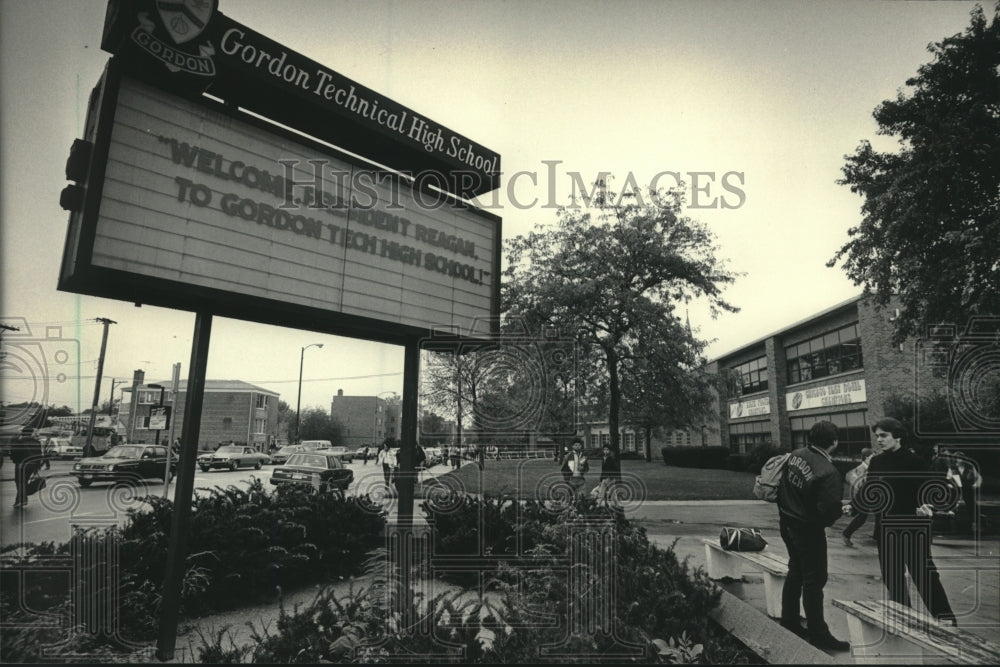 1985, Students in front of Gordon Technical High School Welcome sign - Historic Images