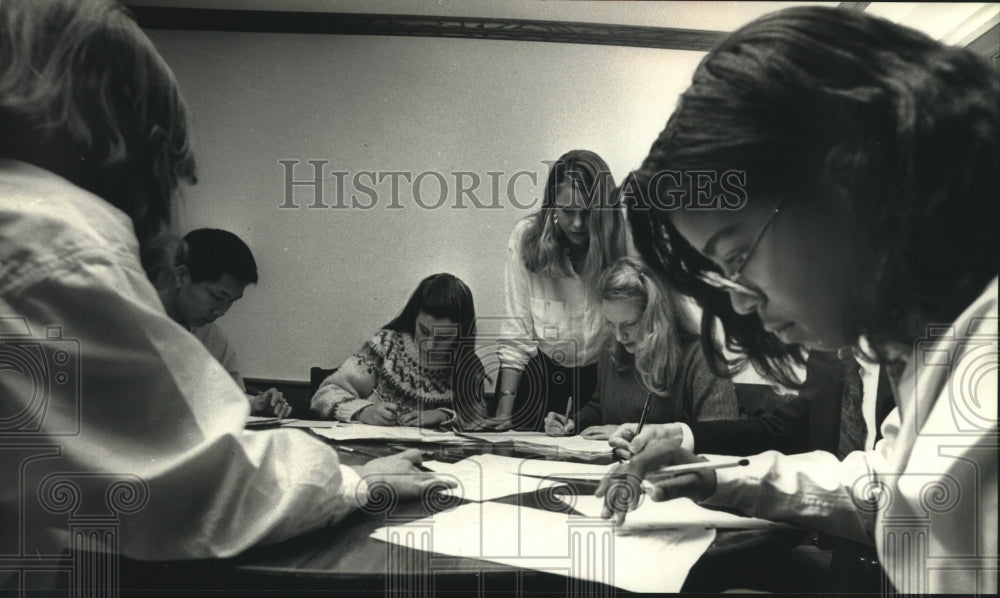 1990, University School of Milwaukee students tabulate survey results - Historic Images