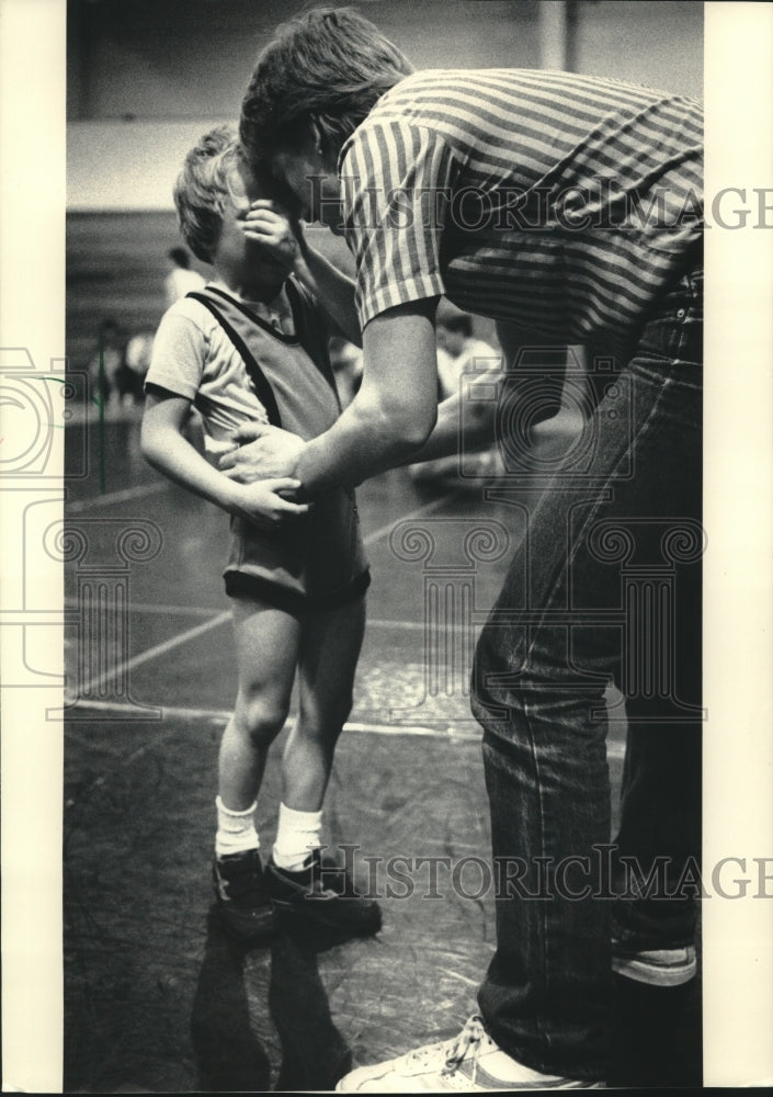 1986 Jason Is Comforted By Coach at Hartford High School Tournament - Historic Images