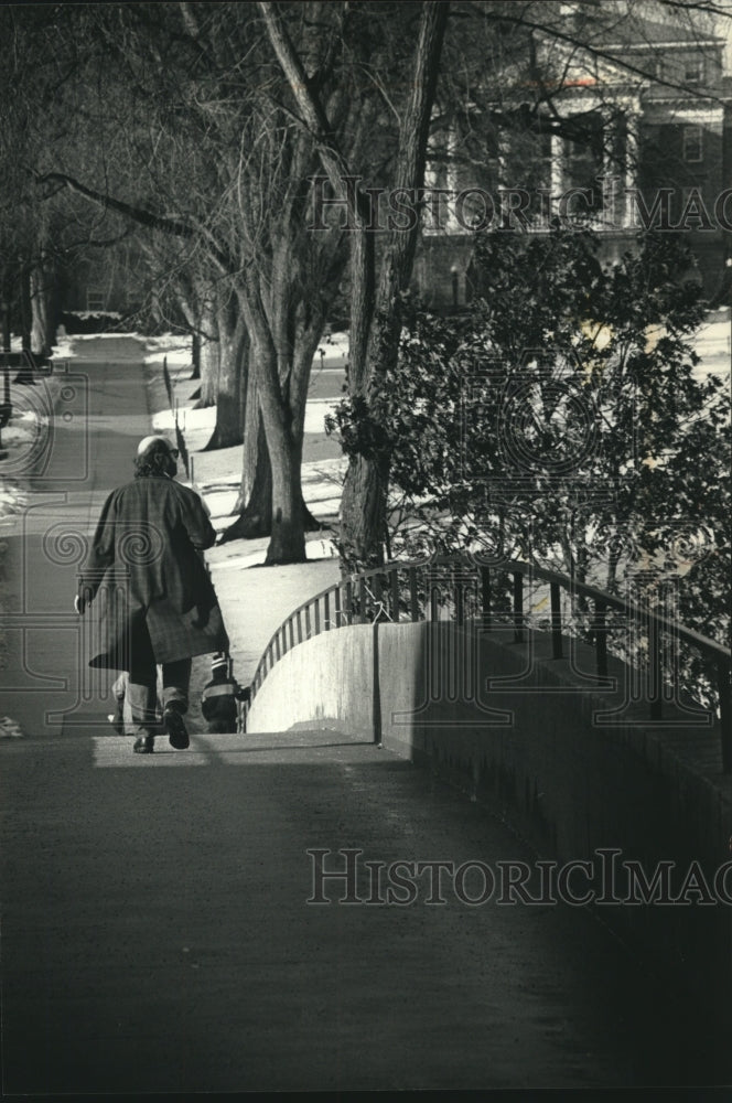 1991 Student walk over the foot bridge toward Bascom Hill, Wisconsin - Historic Images