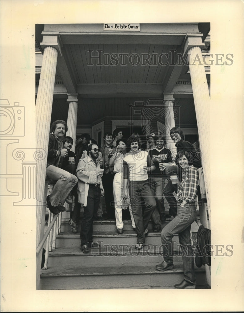 1981, UW Madison students gear up for the weekend with a beer party - Historic Images
