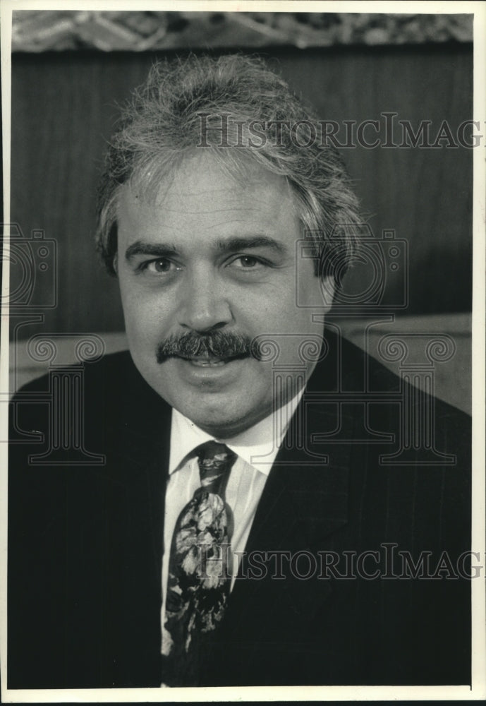 1991, John Peterburs, secretary/manager for Milwaukee Public Schools - Historic Images