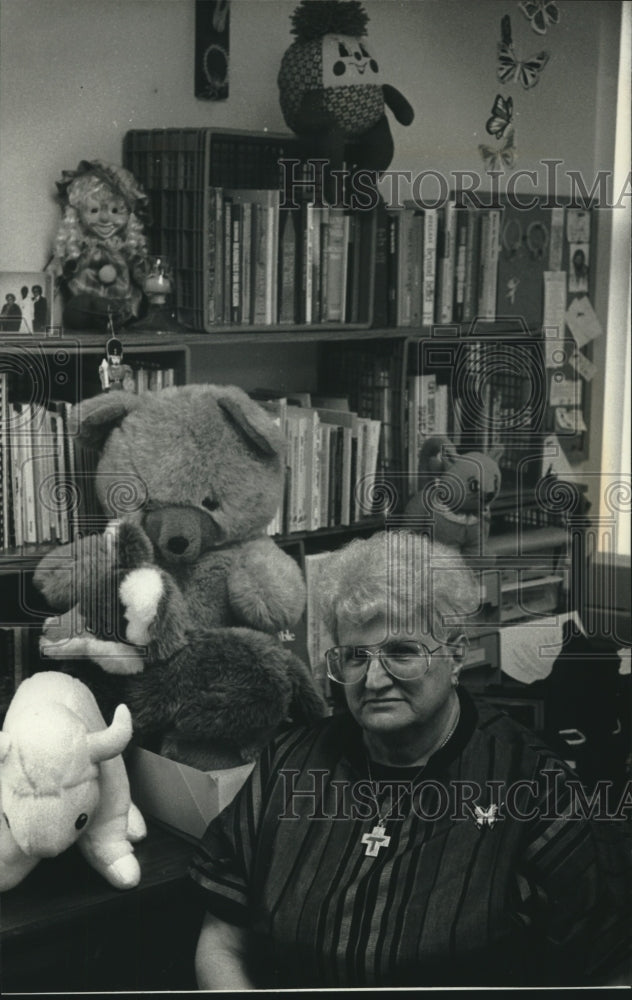 1992, Sister Dolores Pertzborn Sits In Office With Stuffed Animals - Historic Images