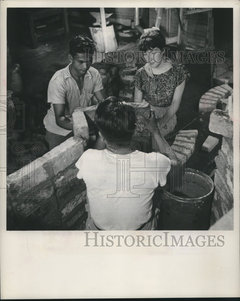 1953, Potters learn to build a high temperature oven, Philippines - Historic Images