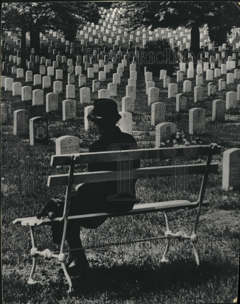 1948, Woman in black sits alone at Arlington National Cemetery - Historic Images