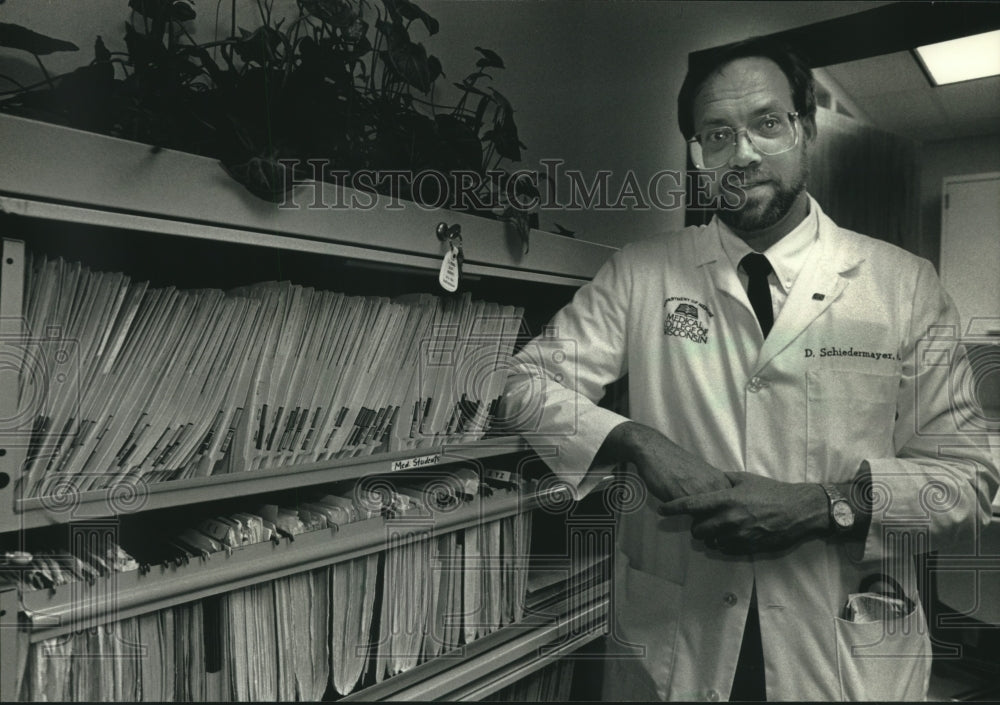 1991, David Schiedermayer Next To Files At Wisconsin Medical College - Historic Images