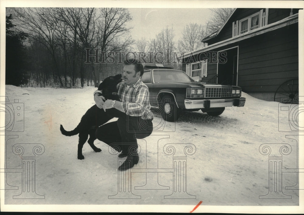 1986 Press Photo Michael Schertz Plays With German Shepherd Pup - mjc25344 - Historic Images