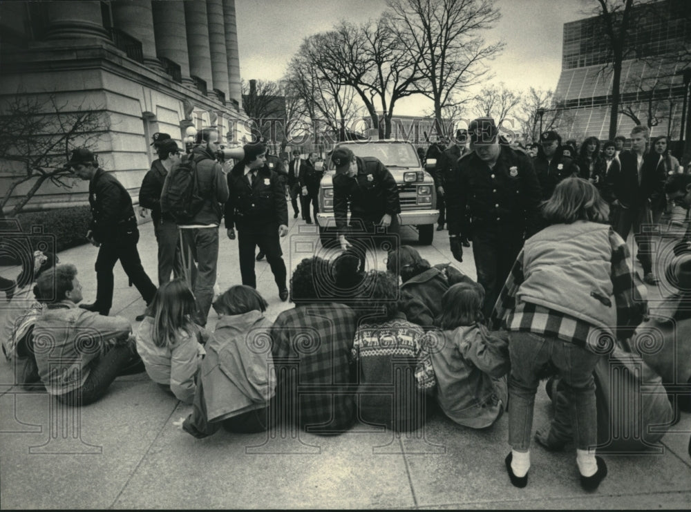 1986, Protesters in path of truck at Capitol grounds, United States. - Historic Images