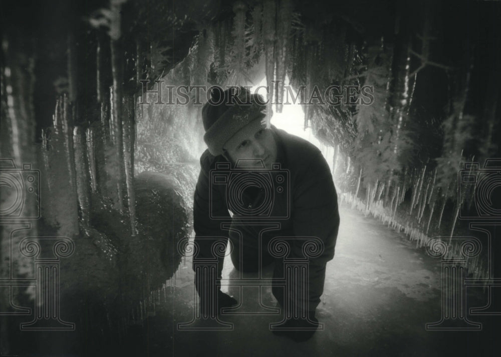 1994, David Stokes inside a ice cave at Schlitz Audubon Center - Historic Images