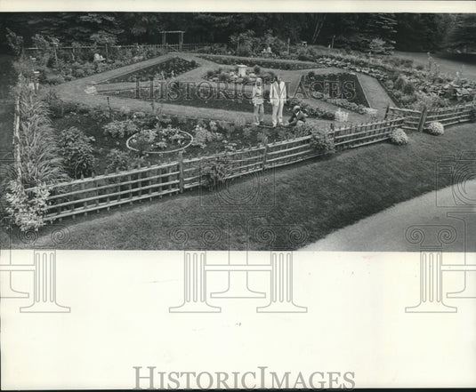 1975, Walter G. Schiller & others in a large herb garden-Wingspread - Historic Images