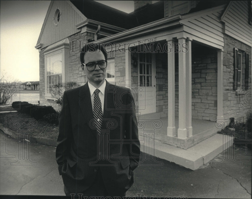 1987, Alan Schimelpfenig stands in front of his Cedarburg home - Historic Images