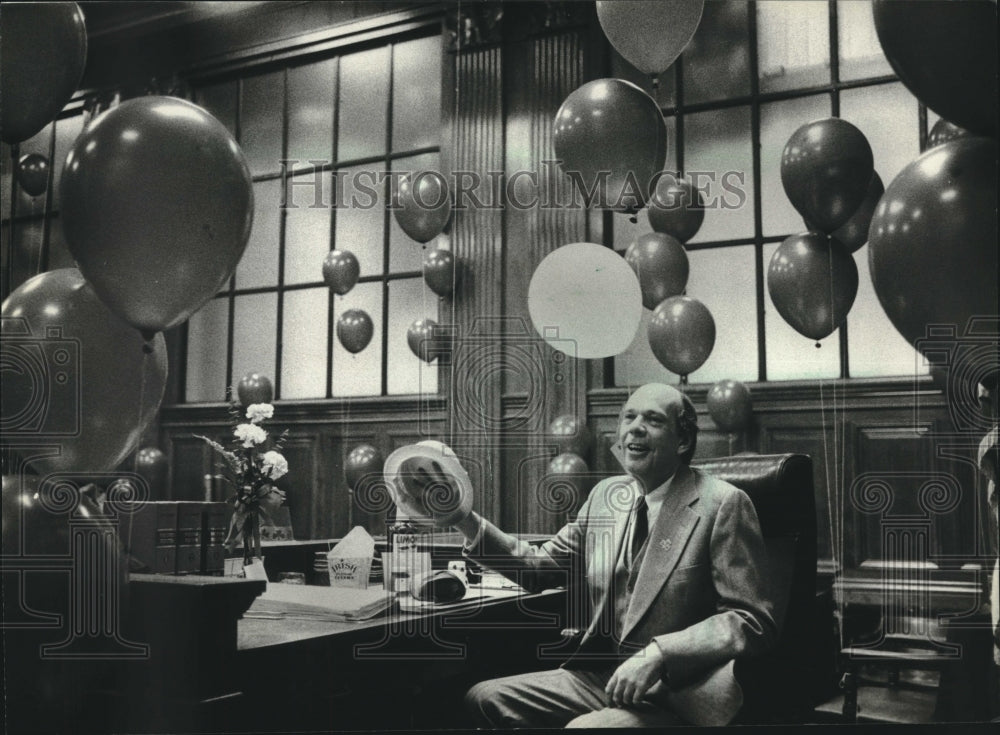 1983, Judge William Shaughnessy in his courtroom with balloons - Historic Images