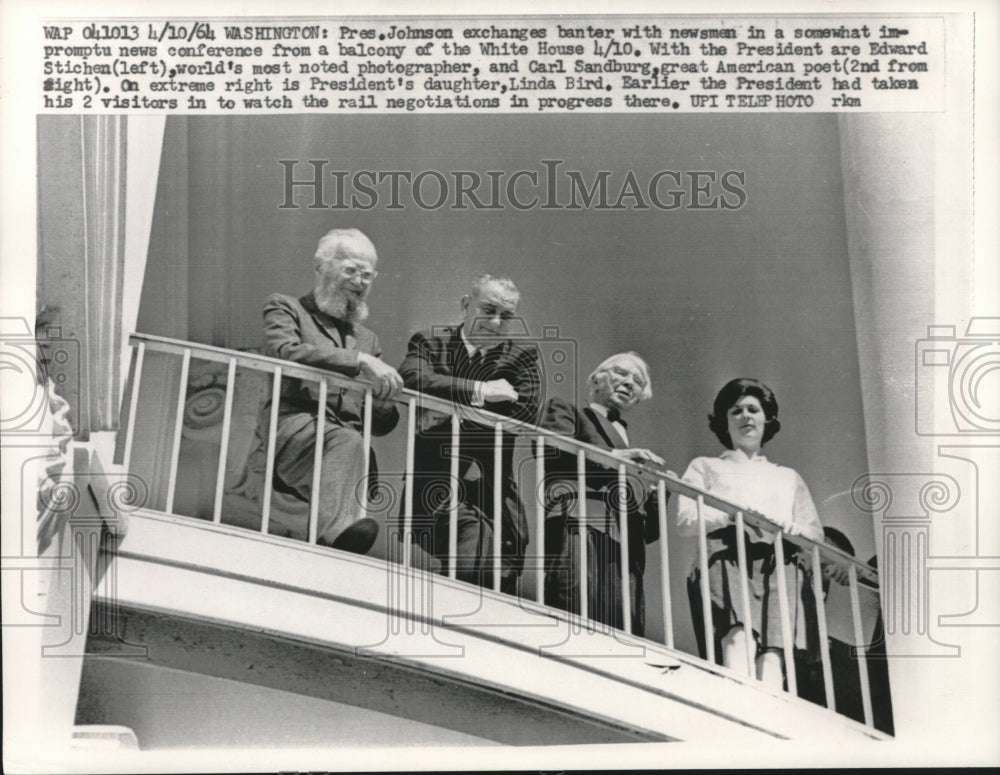 1964, President Johnson with newsmen on the White House balcony - Historic Images