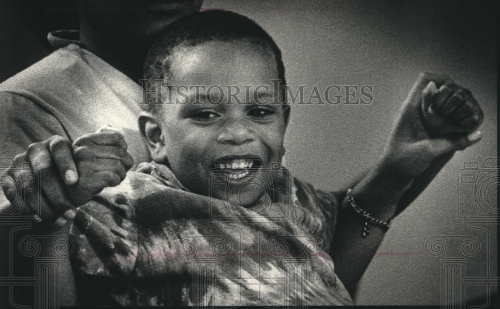 1989, Little Tiffany Garrett at the Shade Tree Women &amp; Family Center - Historic Images