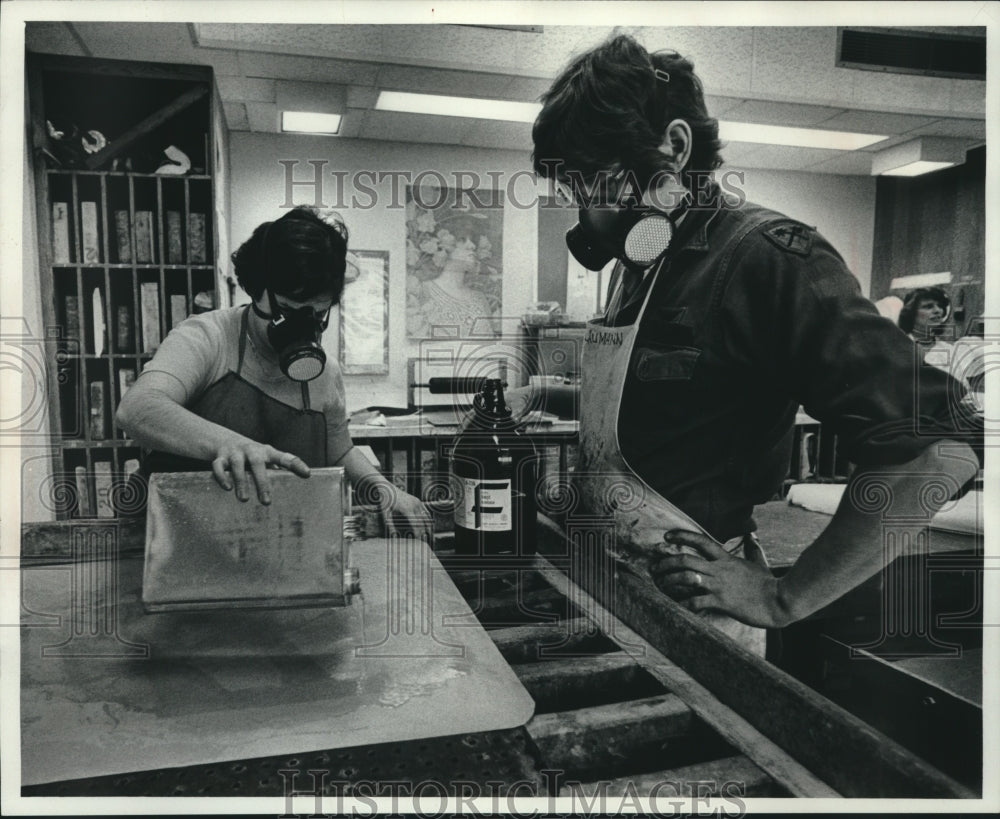 1978, Students wear respirators to work on art at UWM, Wisconsin. - Historic Images