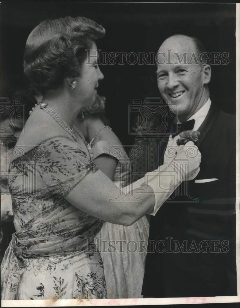 1959, Mrs. William H.L. Smyth and husband at Milwaukee Country Club. - Historic Images