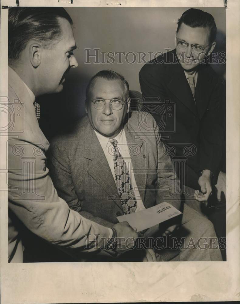 1948, David Uihlein congratulates Henry Wing and Paul Kelsey - Historic Images