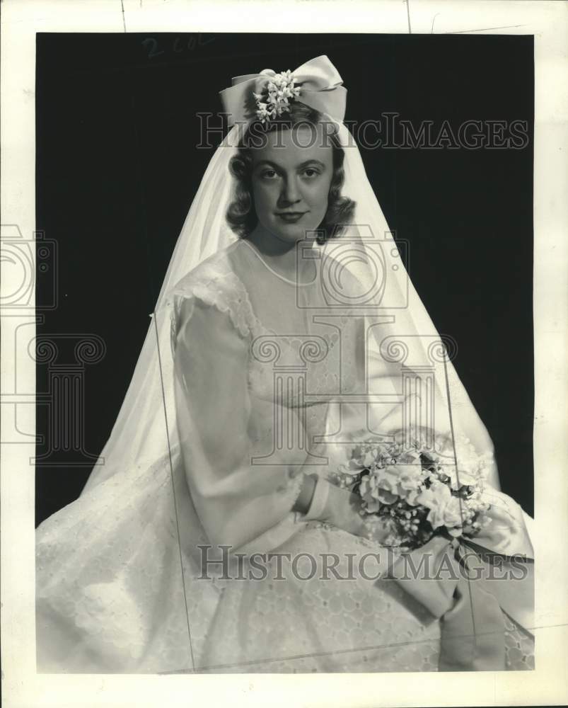 1942 Mrs. Charles S. Winston Jr. in her wedding dress - Historic Images