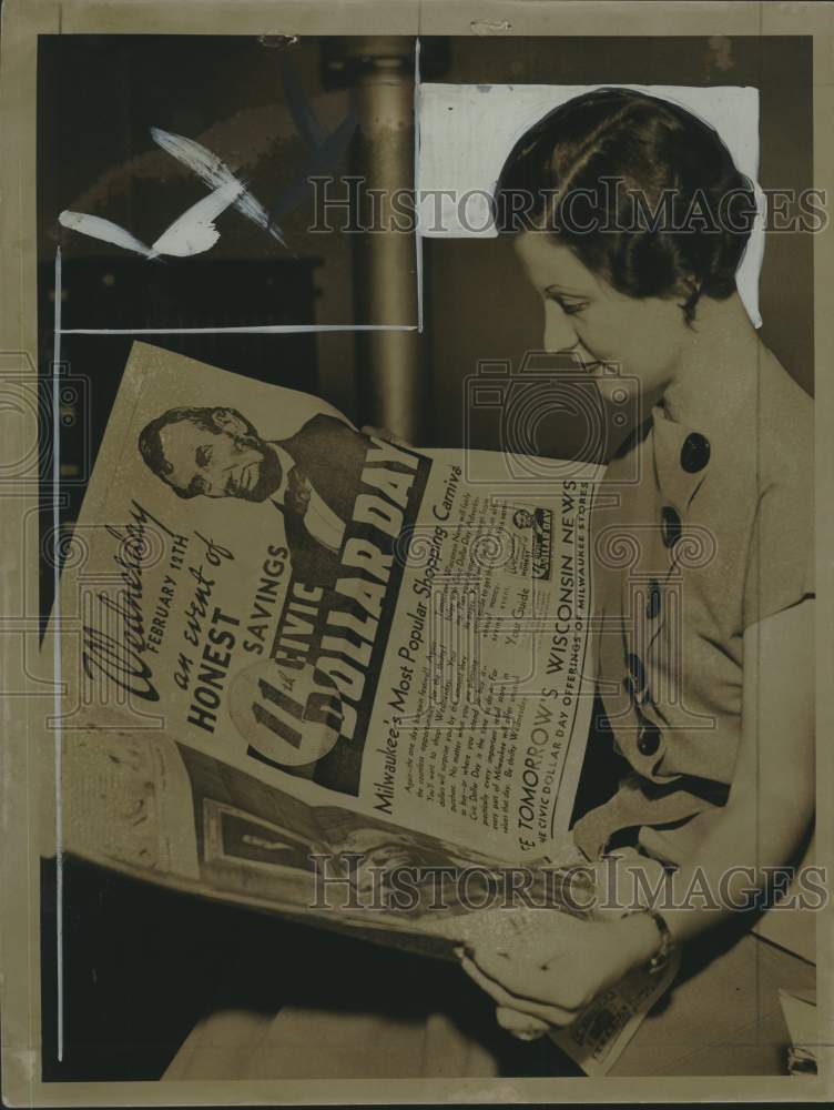 1936, Miss Marie Serr reading newspaper - mjc26556 - Historic Images