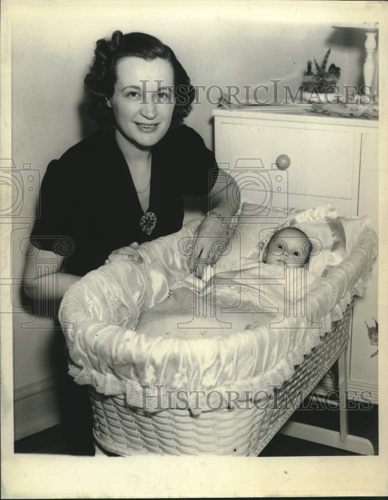 1939, Mrs. Richard W. Werner with a baby in a bassinet - mjc26561 - Historic Images