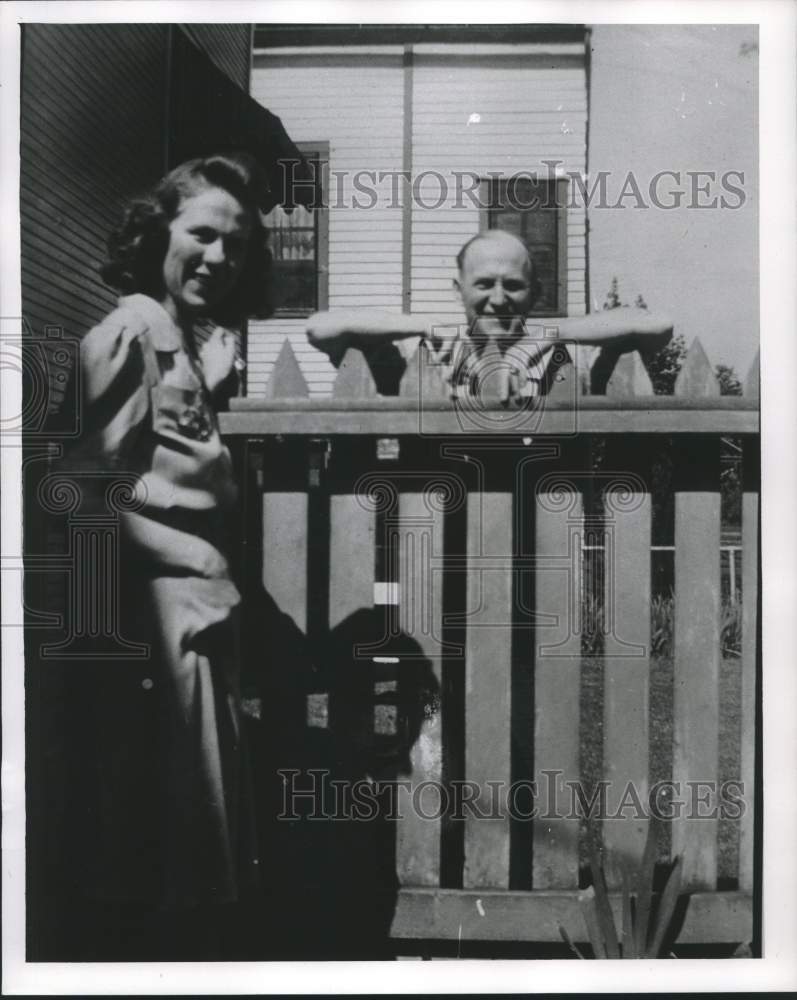 1956, Big girl at 13, she chats with a neighbor. - mjc26670 - Historic Images