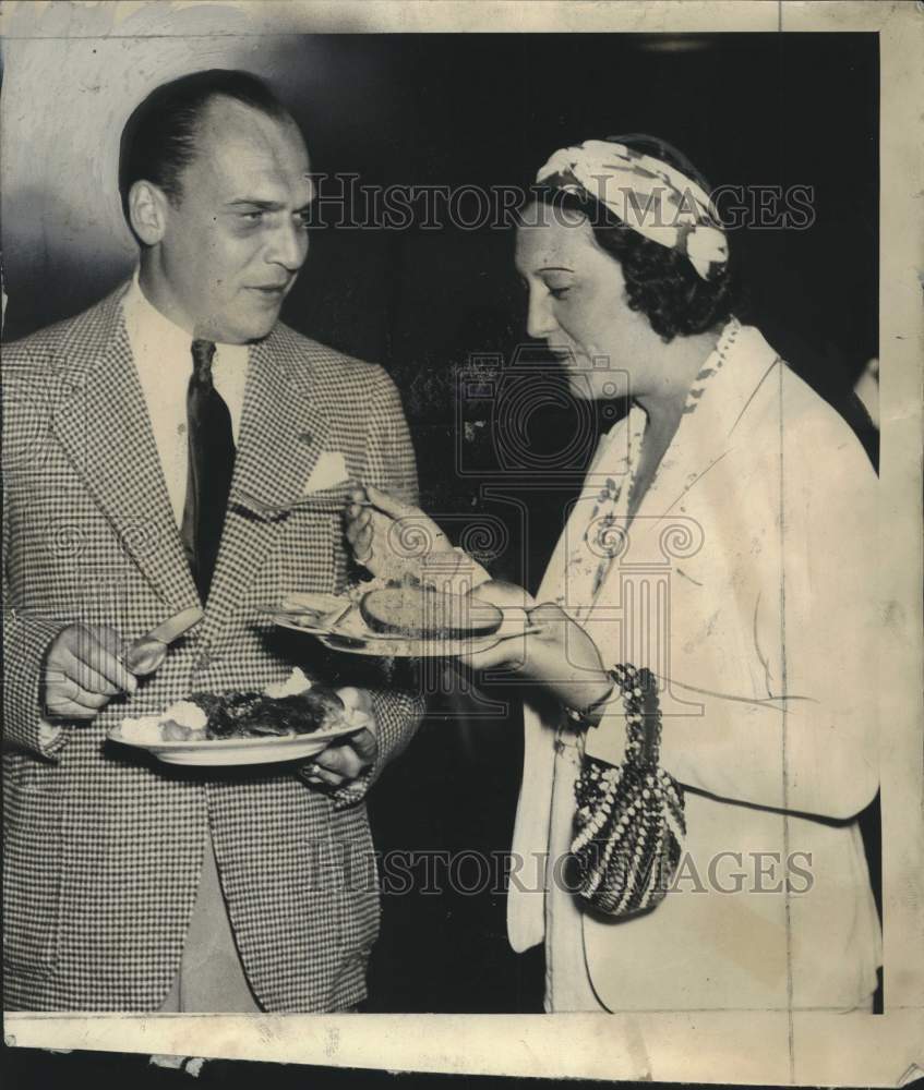 1937, Harry Wiener &amp; Mrs. A.J. Butzen at a party - mjc26859 - Historic Images