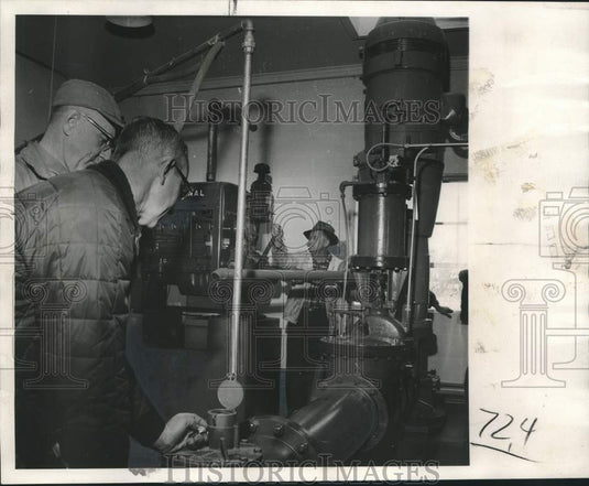 1952, Waupaca officials Vernon Johnson & others check the city well - Historic Images
