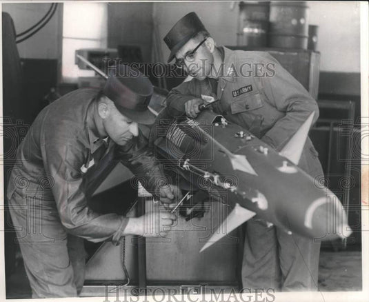 1959 Joseph E. Cote & Ed Kasper test a Ajax missile, Milwaukee - Historic Images