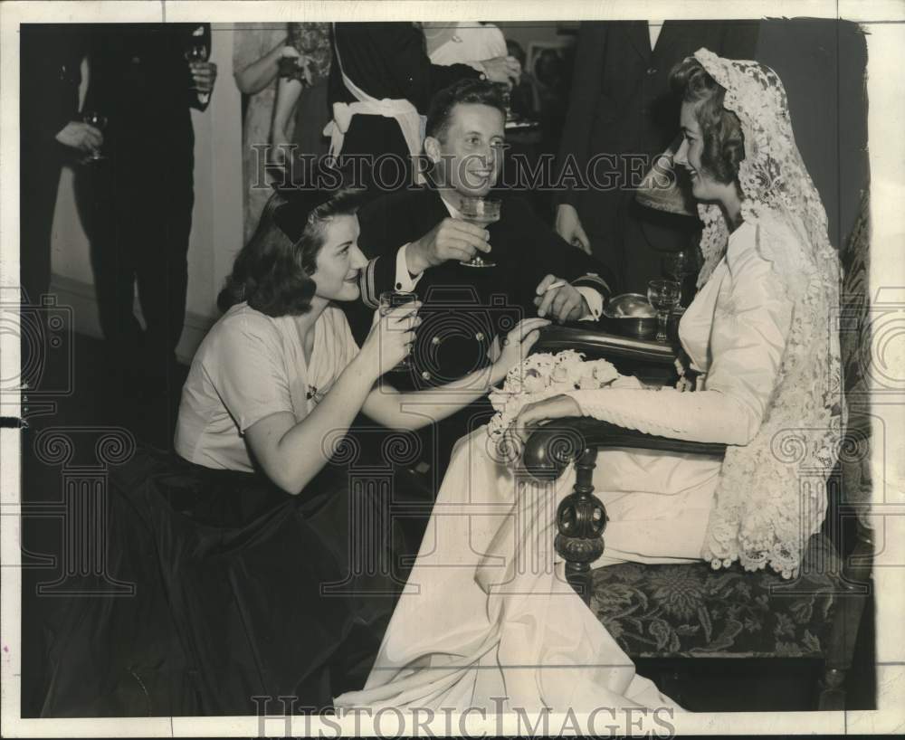 1942, Mrs. A. Carl Stelling III toasted by bridegroom and Mary Falks - Historic Images