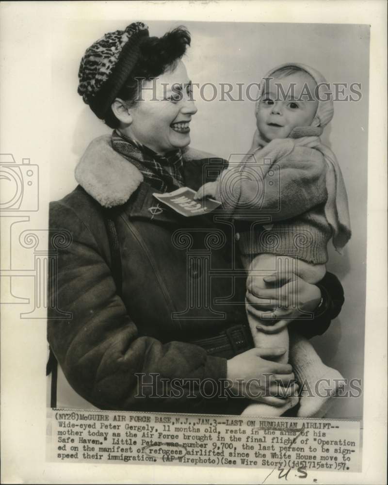 1957, Peter Gergely in his mother&#39;s arms, refugees from Hungaria - Historic Images