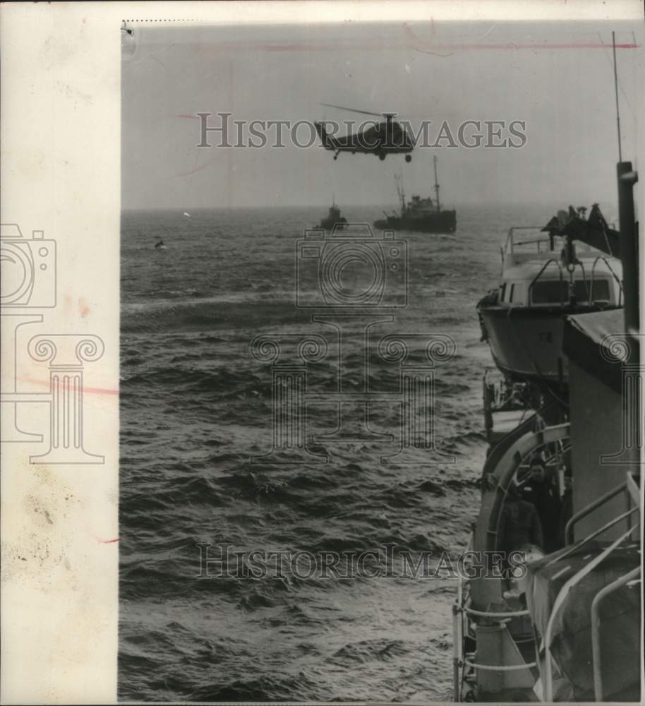 1961, Helicopter &amp; ships searching for sunken radar tower - mjc27740 - Historic Images